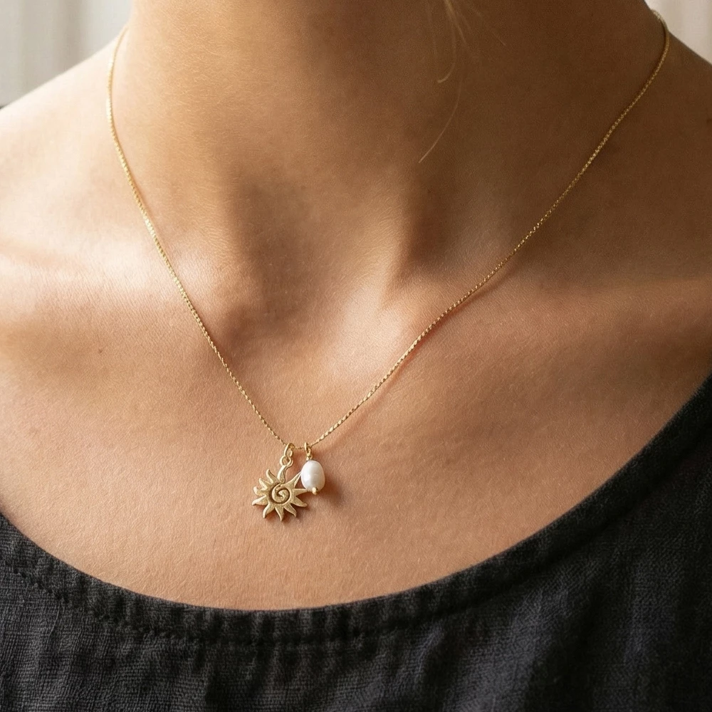 Pearl And Spiral Sun Charm Pendant Necklace