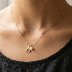 Pearl And Spiral Sun Charm Pendant Necklace