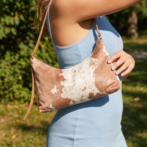 Cow Print Horsebit Baguette Shoulder Bag