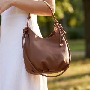 Curved Bar Handle Slouchy Bucket Bag