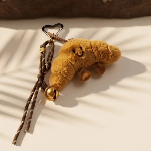 Plush Croissant Jingle Bell Bag Charm