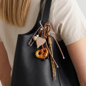 Safety Pin And Ceramic Pretzel Bag Charm