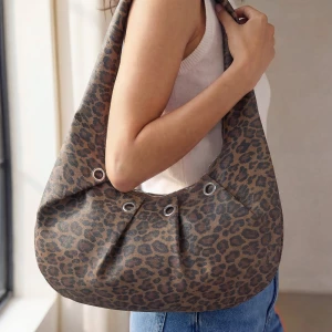 Leopard Print Grommet Accent Hobo Shoulder Bag