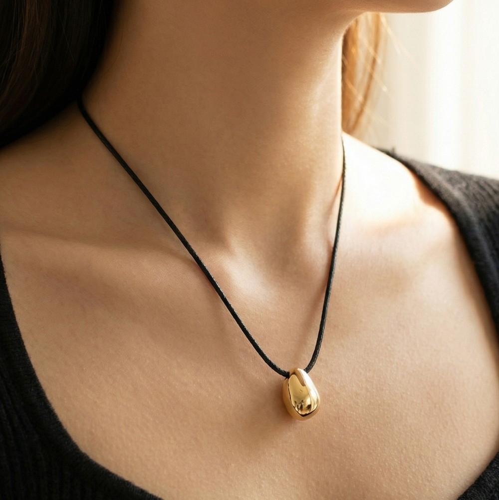 Metallic Oval Pendant Cord Necklace
