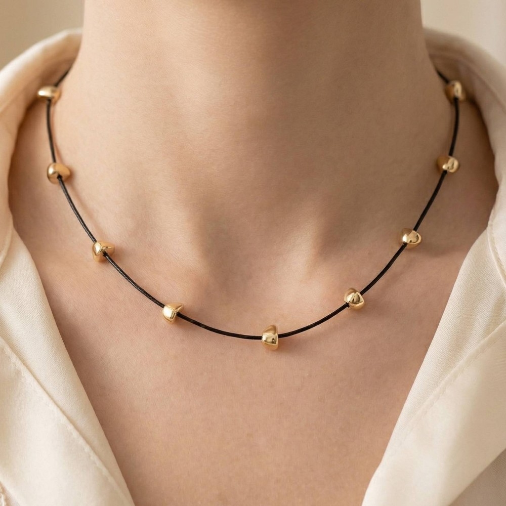 Abstract Metallic Charms Cord Necklace