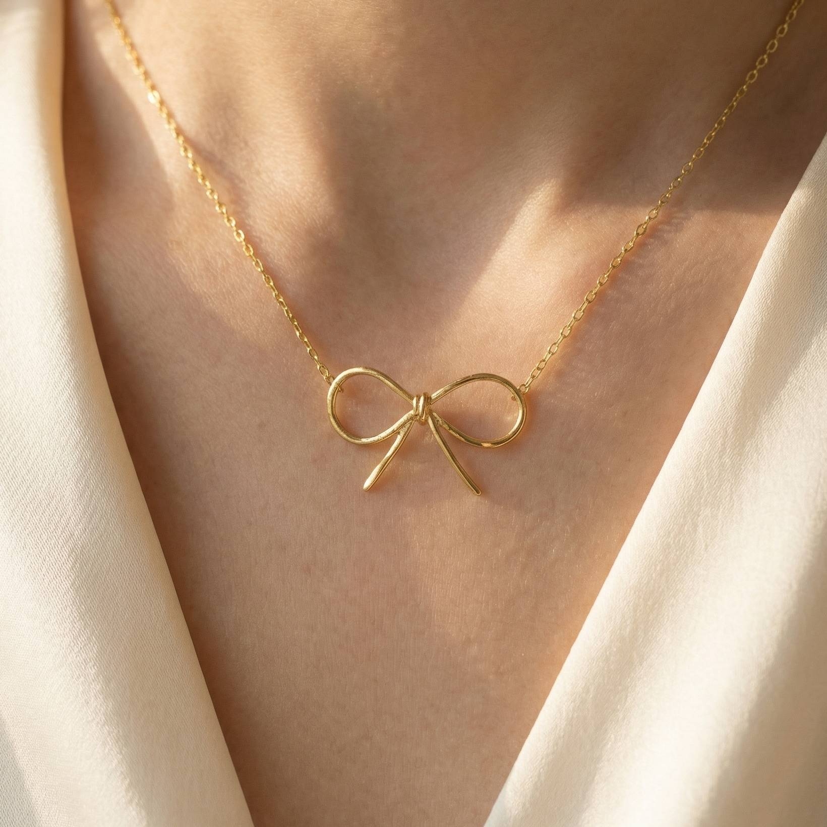 Gold Dipped Bow Tie Pendant Necklace