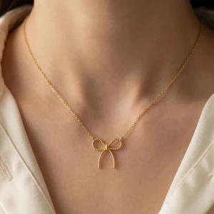 Gold Dipped Textured Ribbon Bow Pendant Chain Necklace