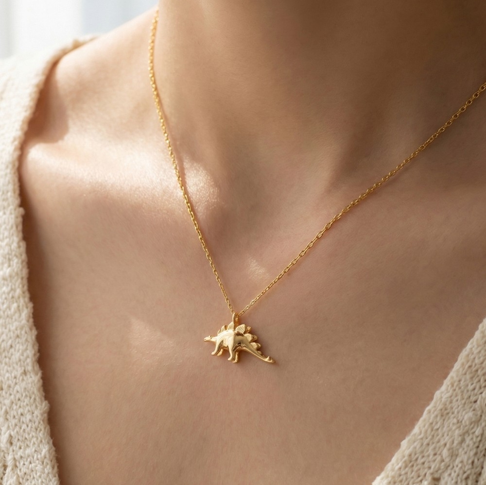 Gold Dipped Stegosaurus Dinosaur Pendant Necklace