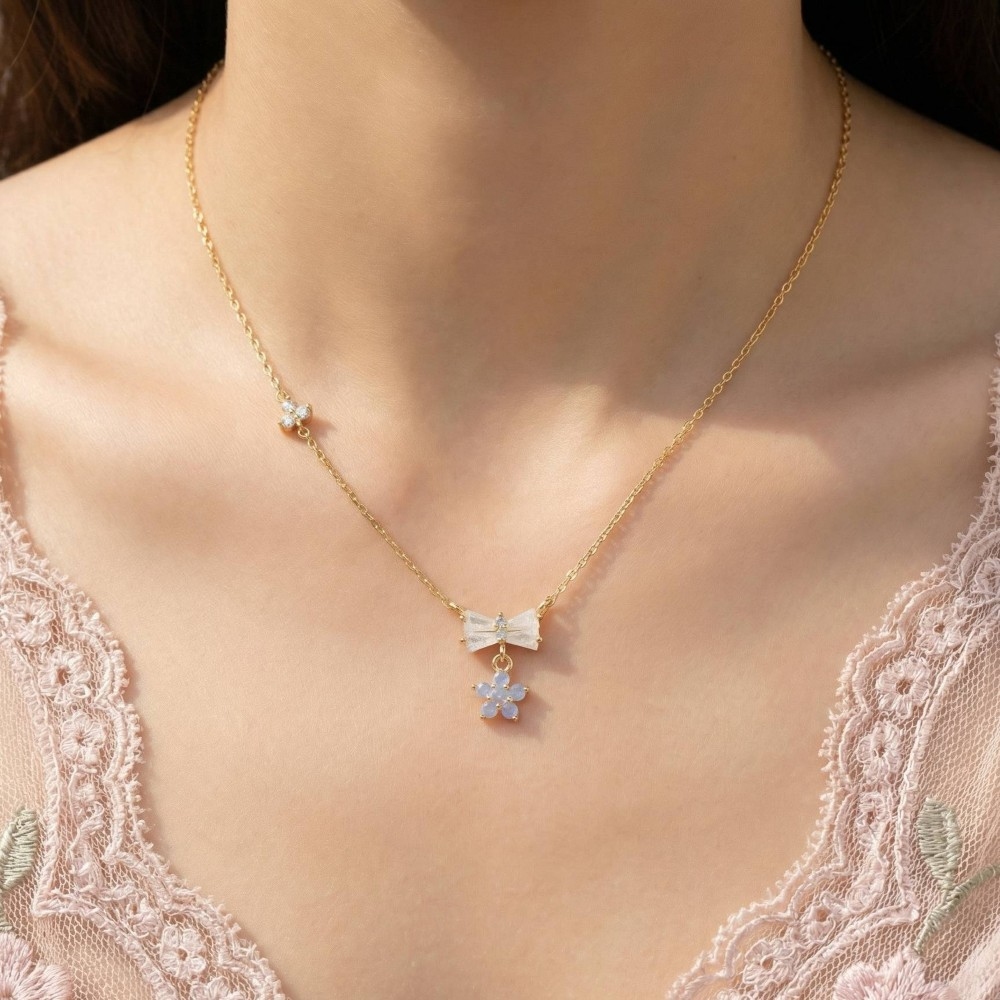 Gold Dipped Cz Bow Tie And Flower Pendant Necklace