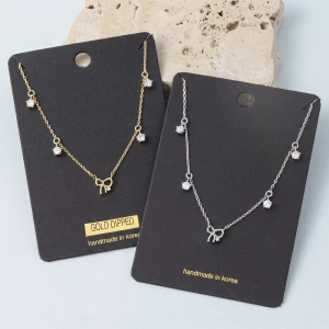 Gold Dipped Bow Pendant Necklace With Cz Drops