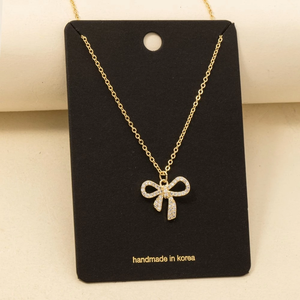Pave Ribbon Bow Pendant Necklace