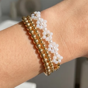 4 Strand Layered Flower Chain And Bead Bracelet