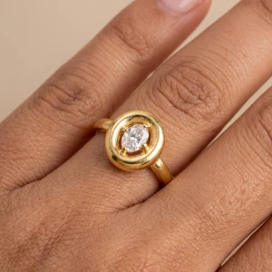 Domed Oval Frame Ring With Prong Set Cz