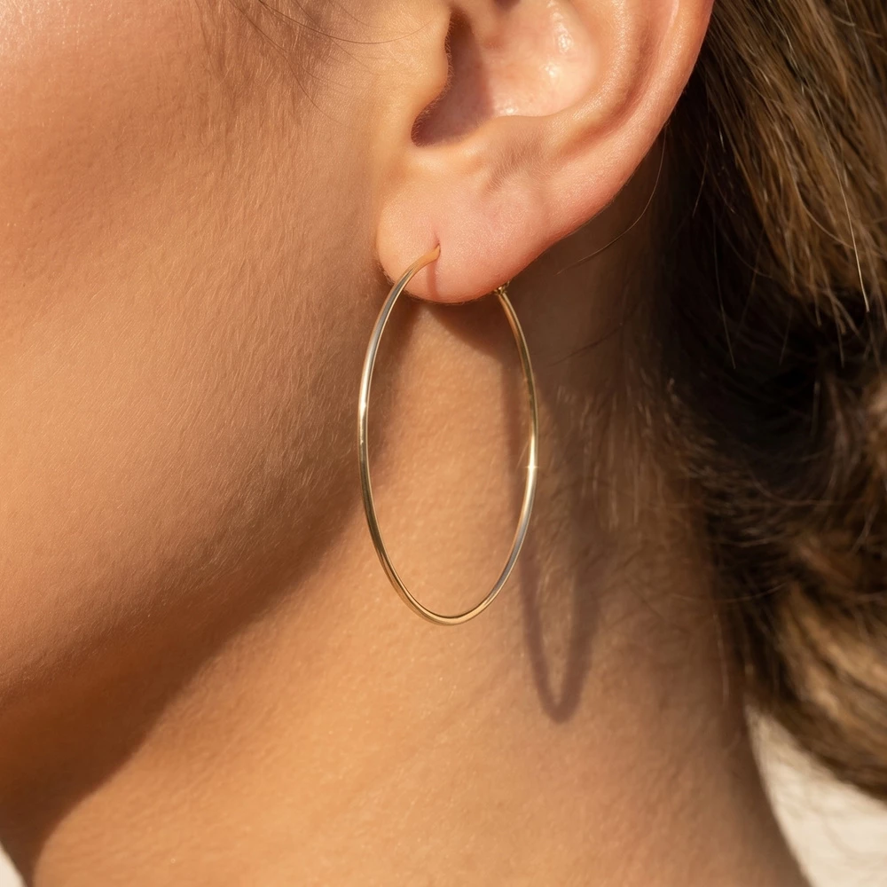 Secret Box Gold Dipped Oval Hoop Earrings