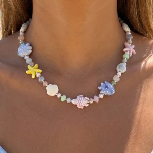Ceramic Sea Life Charm And Pearl Beaded Necklace